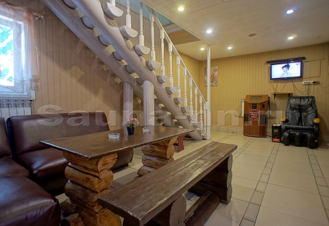 Сауна "Деревенька" — Дом №3 на 8 и более гостей - гостиная с Тв, массажным креслом и караоке